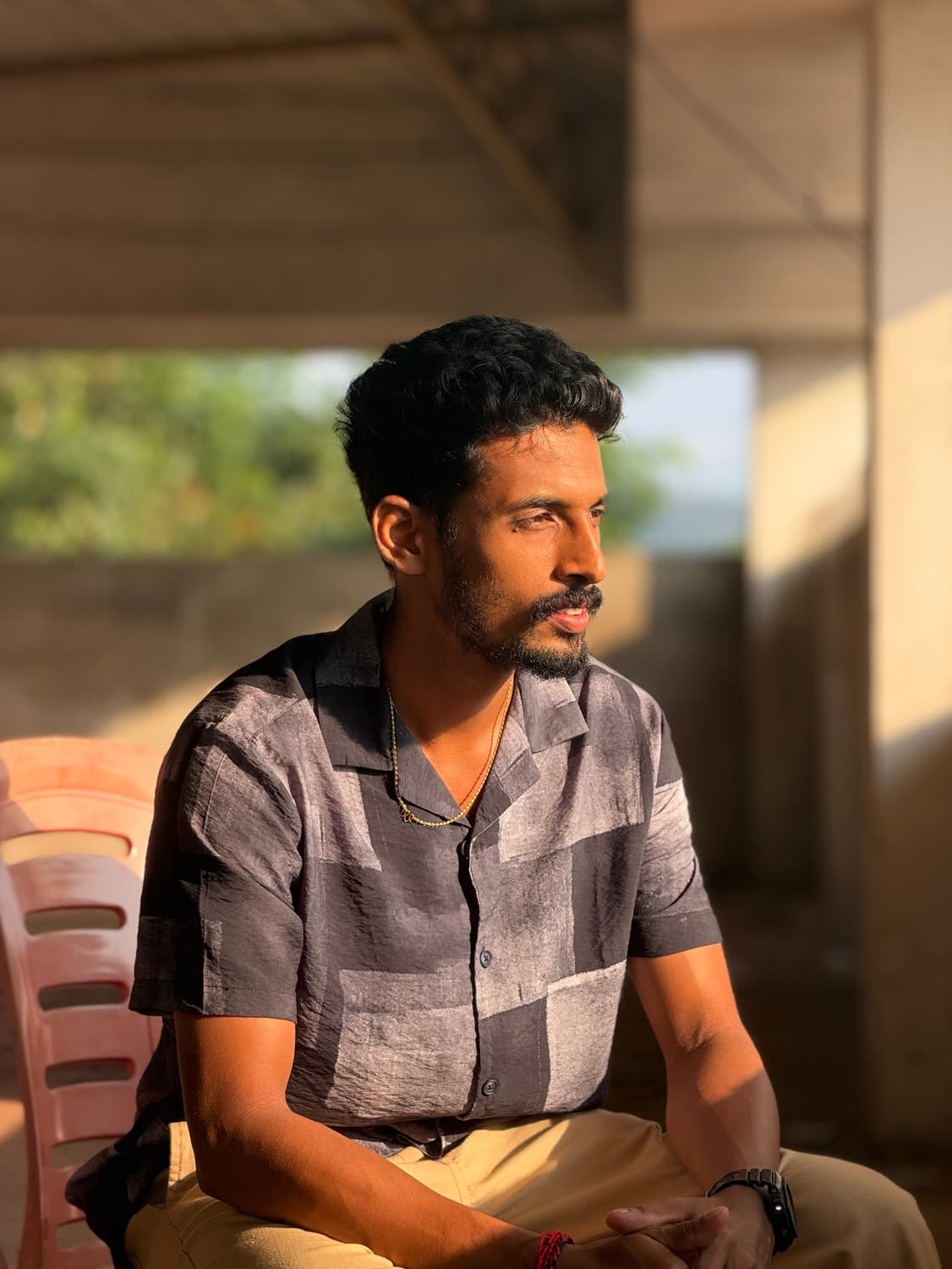 Sagar Shetty sitting in warm afternoon sunlight